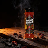 Cobra Chilli Reaper's Harvest Chilli Sauce Extreme 150ml Hot Sauce — styled hero beauty shot in the Cobra Chilli dark gothic western aesthetic