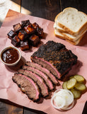 The Kingpin lifestyle — brisket feed with white bread, pickles and onion