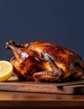 The Mystery Crate lifestyle — glossy roast chicken on a carving board