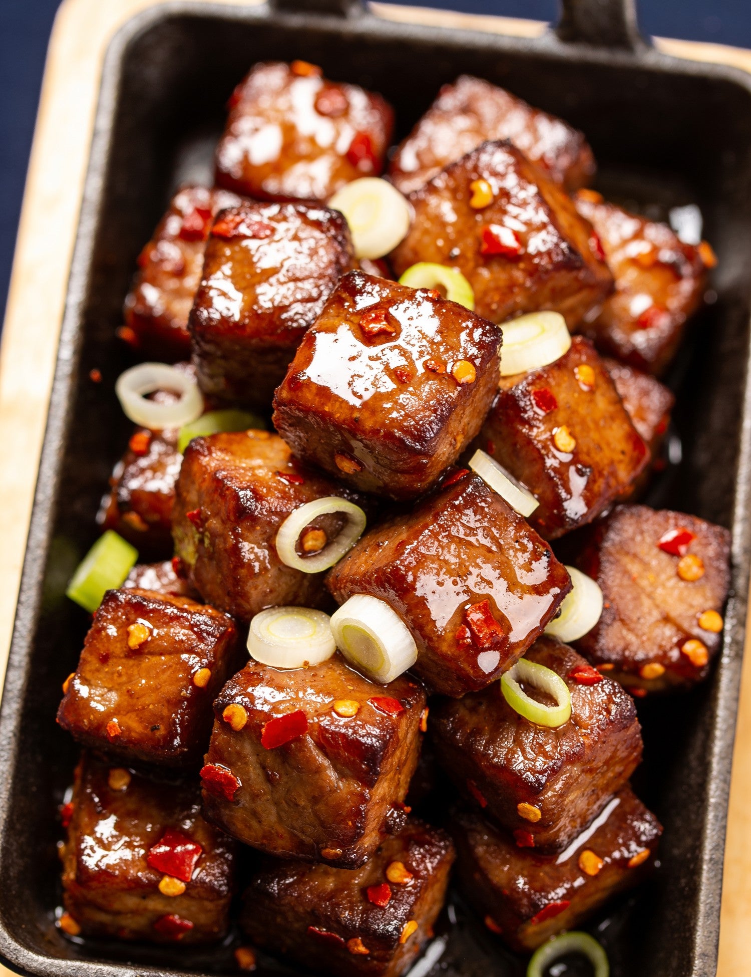 The Quartermaster lifestyle — close-up of glossy hot honey burnt ends