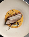 Fire Kitchen by Adam Roberts hardback cookbook — crisp pork belly on a golden sauce with chilli