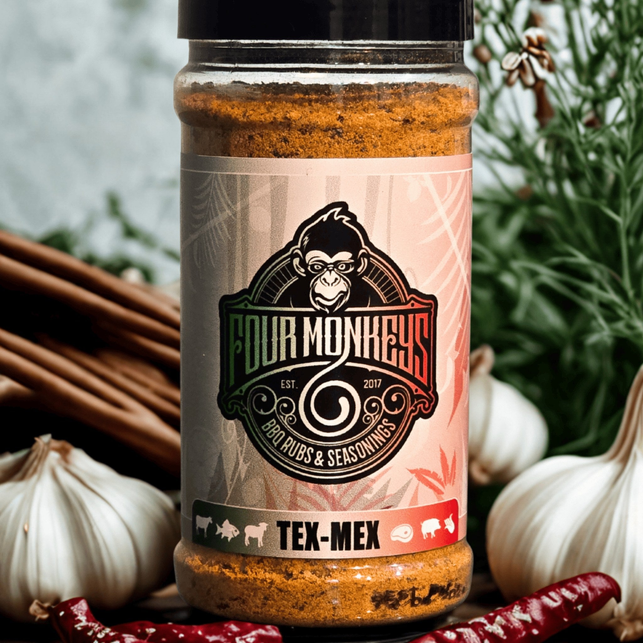 Four Monkeys BBQ Tex-Mex Rub 280g — lifestyle shot of the jar in a Tex-Mex spread