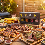 Four Saucemen The Barbecue Gift Box - the gift box beside a backyard BBQ spread