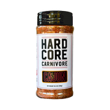 Hardcore Carnivore Cajun Rub — front of shaker on transparent background