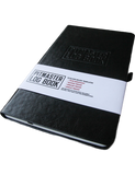 Pitmaster's Logbook by Jess Pryles stone paper logbook — angled shot with its paper band