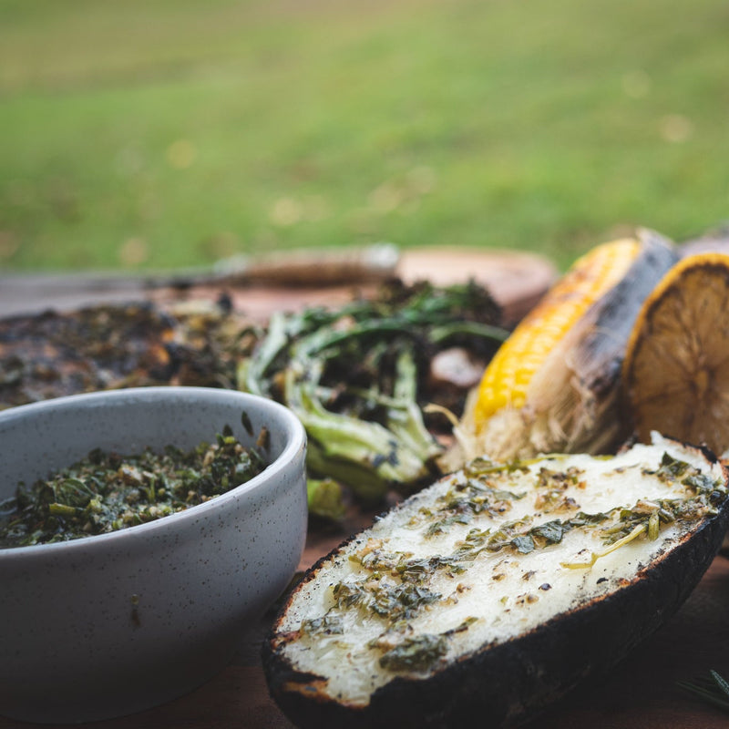 Jimmy Chimichurri spooned over grilled corn, charred lemon and toast lifestyle photo