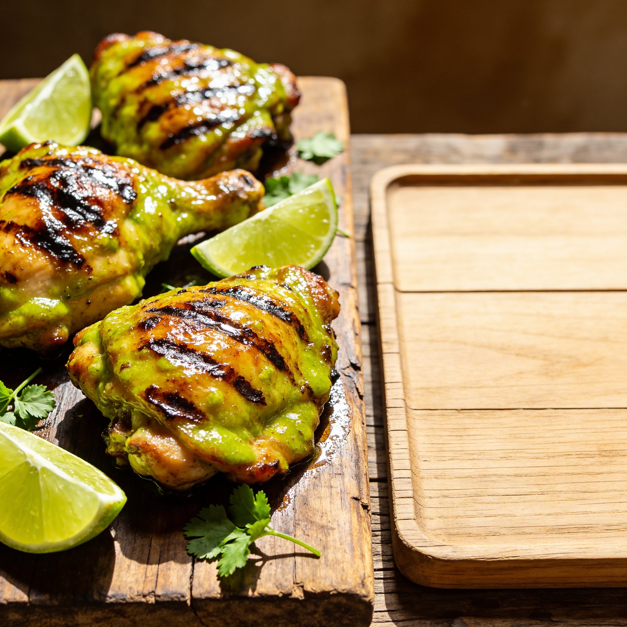 Grilled chicken thighs glazed with avocado-lime dressing.