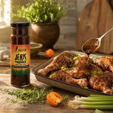 Little Brixton Jerk Marinade — chicken being marinated, bottle beside