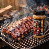 Low n Slow Basics Honey Soy Slammer pork rub — sticky caramelised pork ribs with a honey-soy glaze on a smoker grate