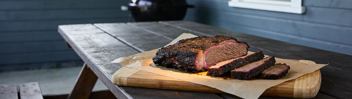 Sliced bark-crusted brisket for The Rub Hub Low & Slow Brisket Box