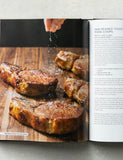 Meat Illustrated by America's Test Kitchen hardback cookbook — Pan-Seared Thick-Cut Pork Chops spread