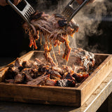 Middle Kingdom Pork Priest 170g pork seasoning — smoked pulled pork being pulled into moist strands with steam rising