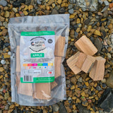 Natural Smoke BBQ Woods Apple wood chunks 1kg bag on location with raw wood chunks