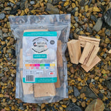 Natural Smoke BBQ Woods Aussie Oak wood chunks 1kg bag on location with raw wood chunks