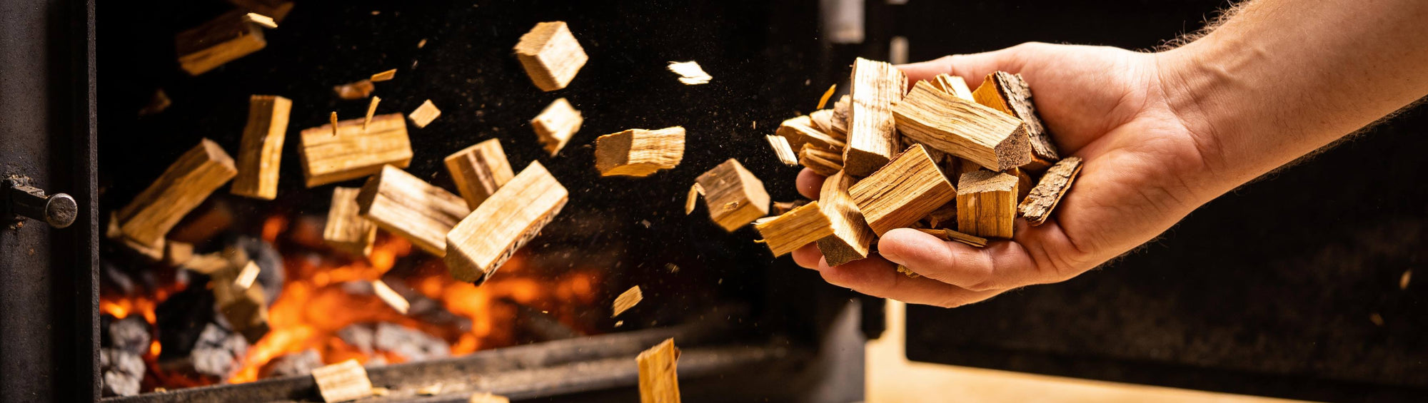 Sun-bleached Aussie oak wood chunks on a timber bench in warm natural light