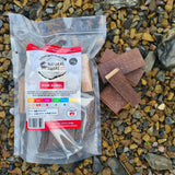 Natural Smoke BBQ Woods Wine Barrel wood chunks 1kg bag on location with raw wood chunks