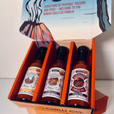 Nomad Chilli Co Barbecue Trio hot sauce gift bundle — open box showing Tamarind Gold, The BBQ Sauce and Reaper Roja