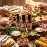 Nomad Chilli Co Classics Trio hot sauce bundle — three bottles on a taco-night grazing board