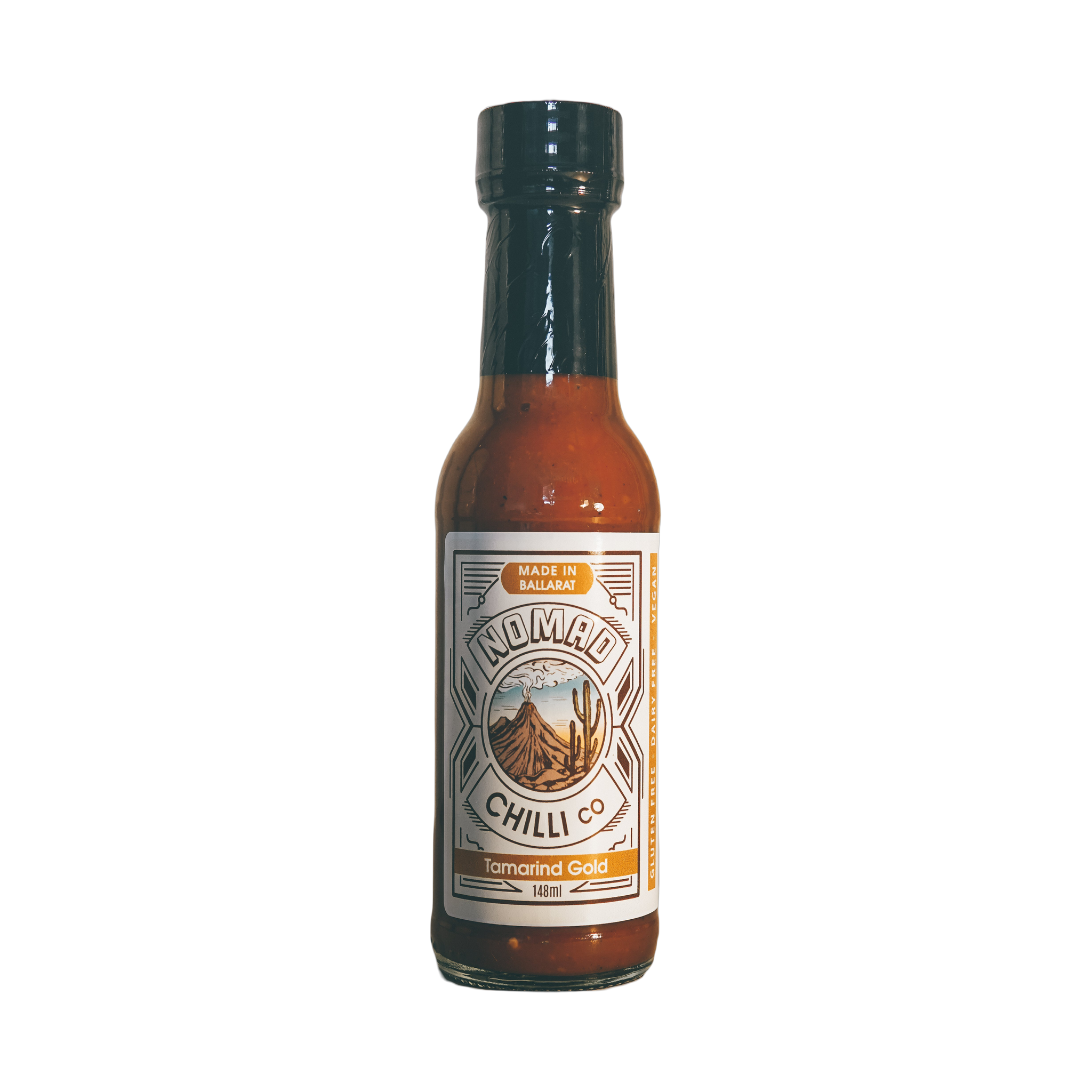 Nomad Chilli Co Tamarind Gold fermented hot sauce 148ml, front of bottle on transparent background
