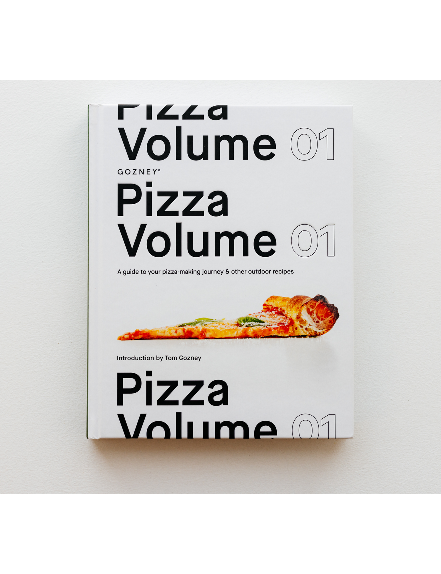 Pizza Volume 01 by Gozney hardback cookbook — book standing upright