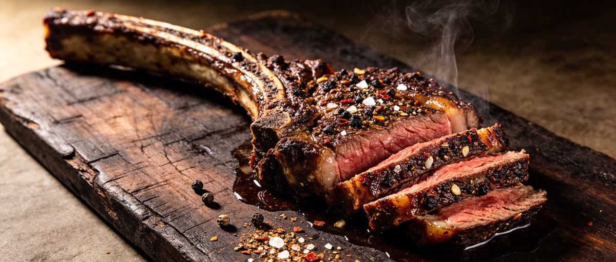Republic Signature Beef rub crust on a sliced medium-rare tomahawk steak