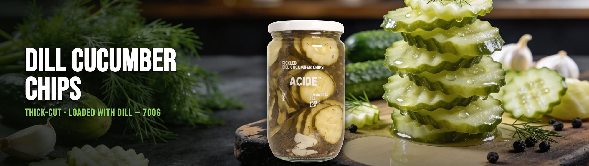 ACIDE Dill Cucumber Chips 700g jar on a rustic board with crinkle-cut dill pickles, fresh dill and garlic, Melbourne crinkle-cut dill pickle