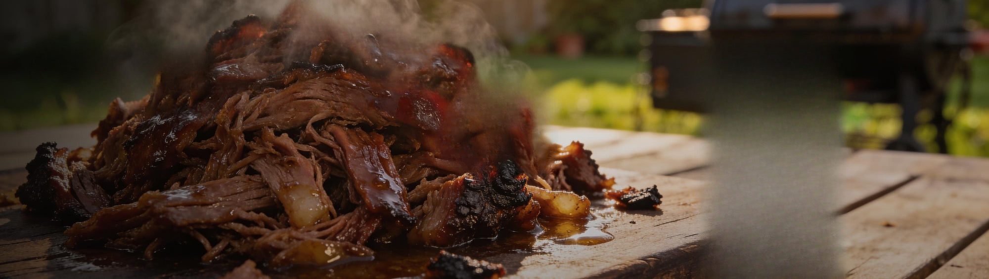 Four Monkeys BBQ Pork Rub 240g beside a glossy paprika bark pulled pork