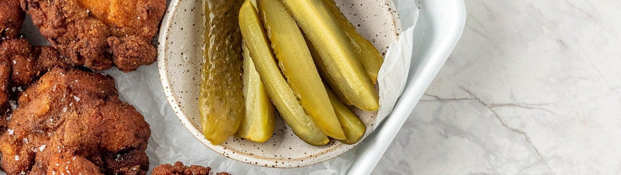 Rum and Que Dirty Bird Nashville Fried Chicken Seasoning banner — crispy fried chicken with pickles