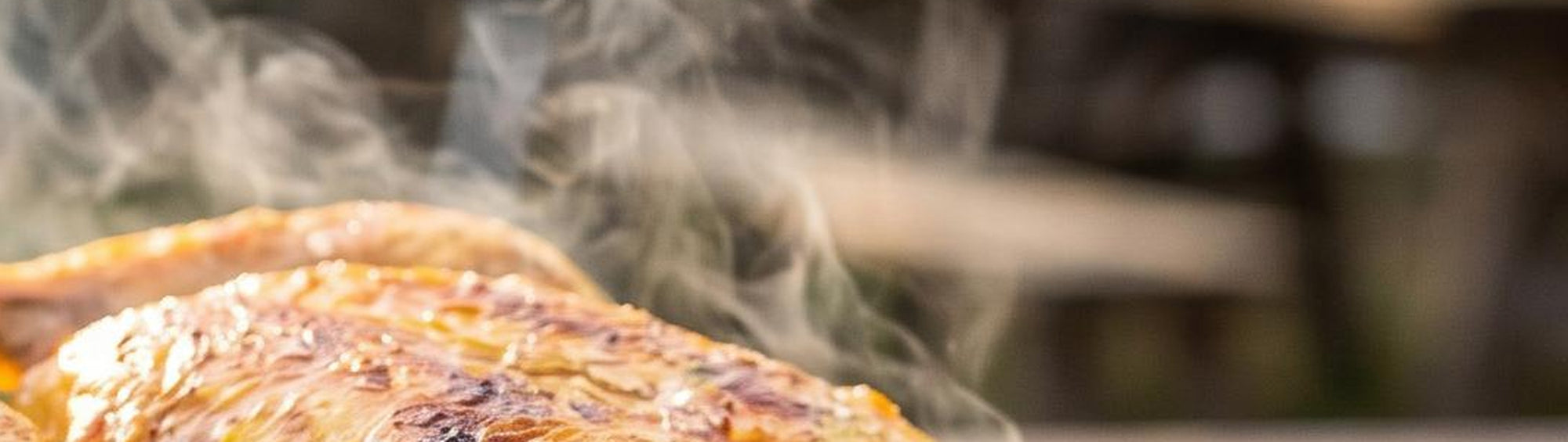 Smokes Seasoning Pork-Poultry BBQ Rub beside golden rotisserie chicken glistening with steam, pork and chicken rub