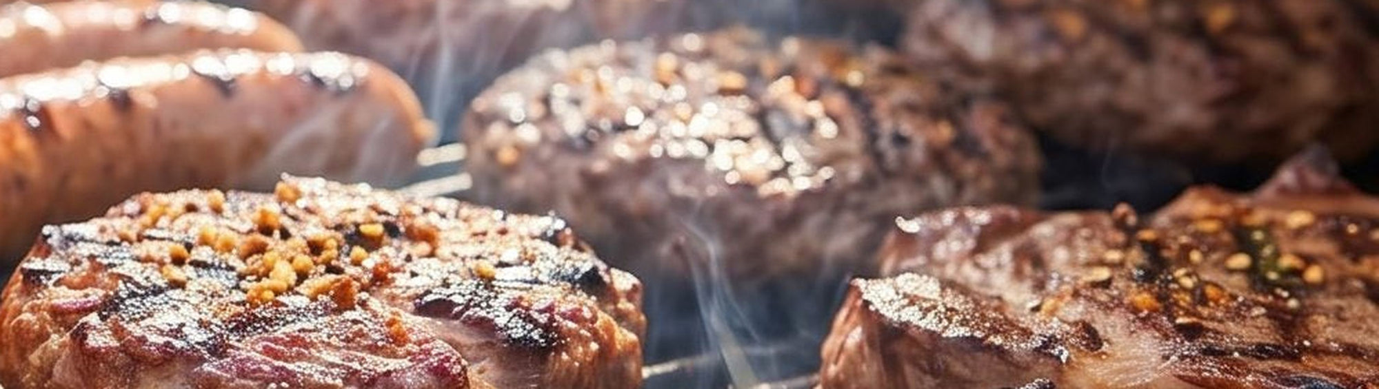 Smokes Seasoning The Standard all-purpose BBQ Rub beside sausages, burgers and steaks searing on a backyard grill