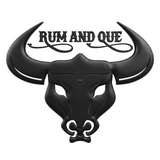 Rum and Que barbecue brand logo, 3D embossed black bull's head with curved horns over the RUM AND QUE wordmark, white die-cut sticker outline, on transparent background