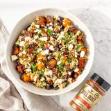 Rum and Que Bull Dust all purpose rub — roasted pumpkin, brown rice and feta salad with the shaker alongside