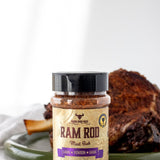 Rum and Que Ram Rod game rub — herb-crusted roast lamb with the shaker alongside