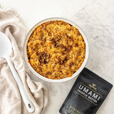 Rum and Que Umami Truffle Butter finishing seasoning — baked crumbed pasta dish with the pouch alongside