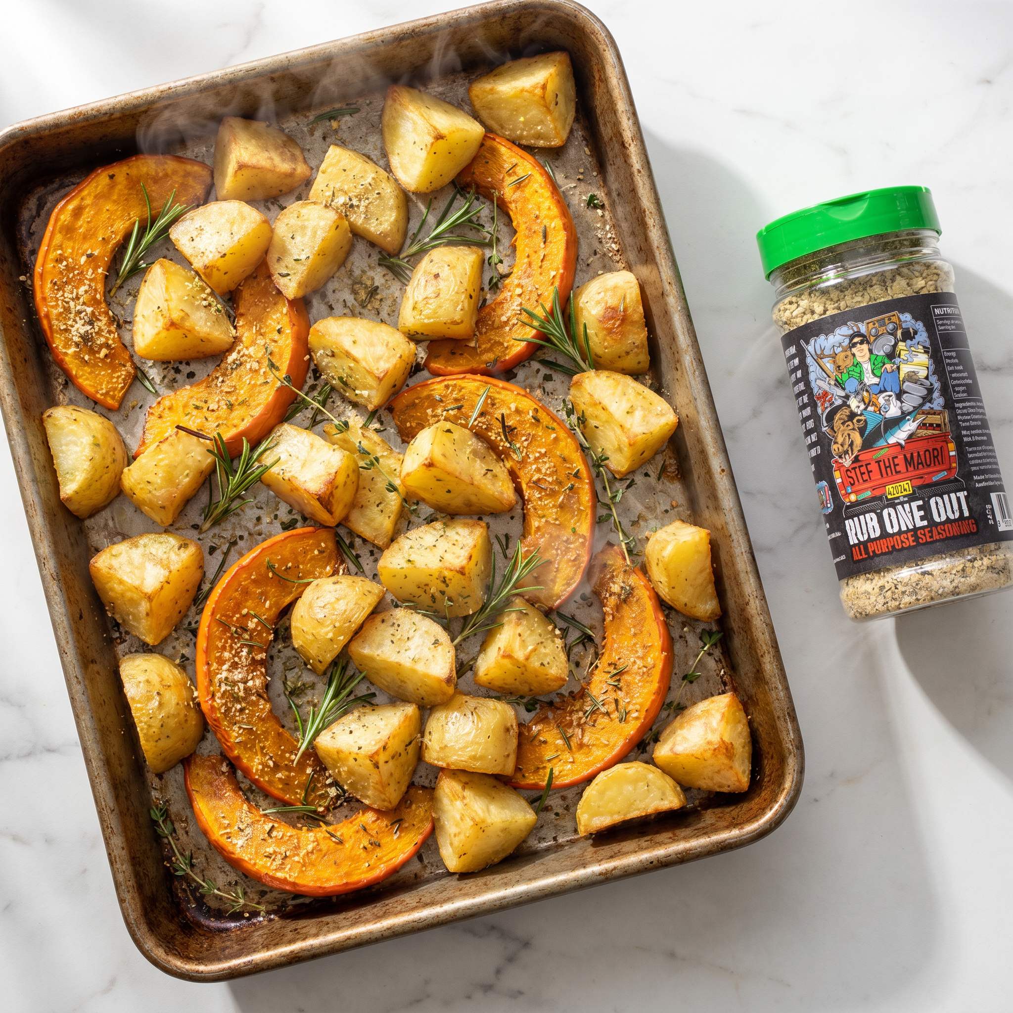 Stef the Maori Rub One Out all purpose seasoning — tray of golden roast potatoes and pumpkin fresh from the oven