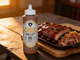CROIX VALLEY: Sweet Carolina Gold BBQ Sauce - lifestyle scene with glazed ribs and pulled pork