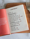 The Little Book of KC BBQ by Jonathan Bender hardback cookbook — open book showing the contents