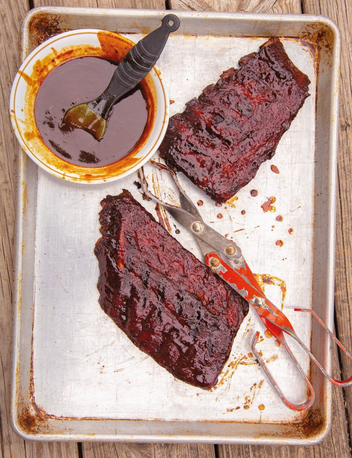 The Meathead Method by Meathead Goldwyn hardback cookbook — interior page of Kansas City red sauce and glazed ribs