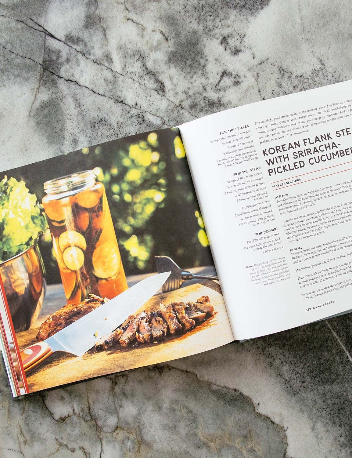 The New Camp Cookbook by Linda Ly hardback cookbook — open spread of Korean flank steak with sriracha-pickled cucumbers