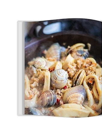The Solid Cookbook Vol. 1 by Solidteknics hardback cookbook — interior page of clams with white wine and white fish
