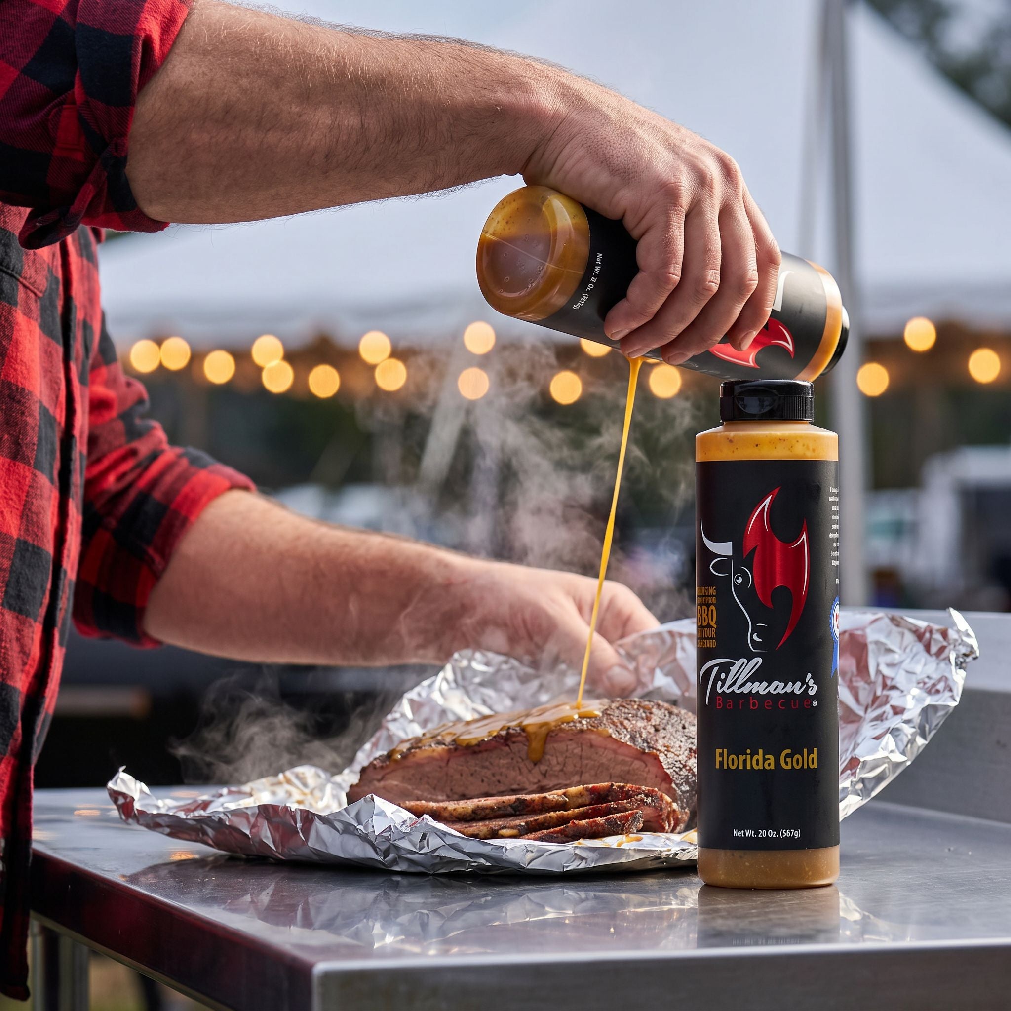 Tillman's Barbecue Florida Gold mustard BBQ sauce — poured over a brisket point before wrapping in foil