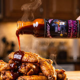 Valkyries Vision sauce drizzled over hot chicken wings
