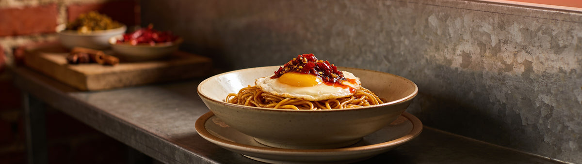 Noodles and fried egg topped with crispy chilli oil - Uncle Mungo's Crispy Chilli Oil
