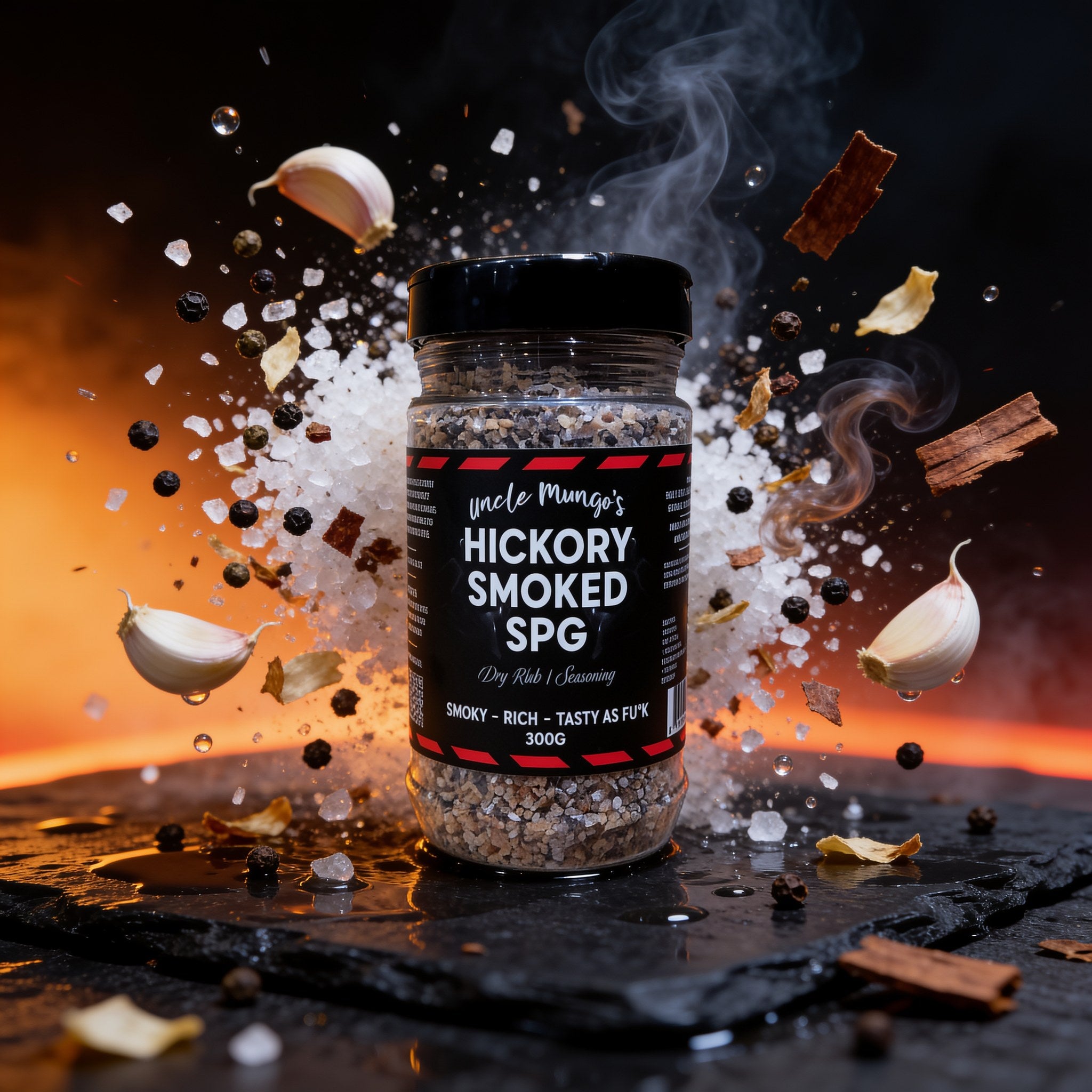 Uncle Mungo's Hickory Smoked SPG 300g hickory smoked salt pepper garlic rub — exploded high-speed shot with sea salt, black pepper and garlic