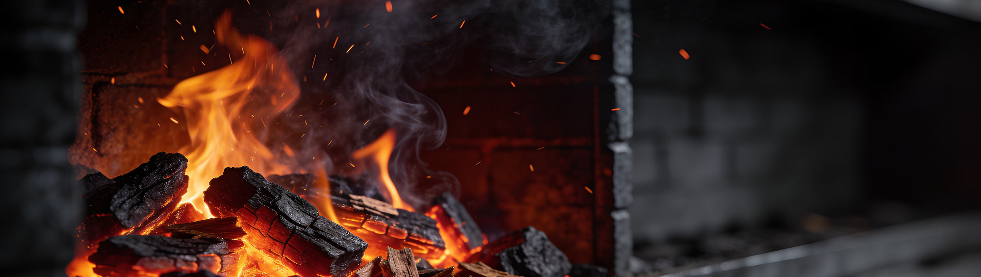 Western BBQ Products Mesquite Smoking Wood Chips banner background — mesquite wood chips smouldering on glowing embers